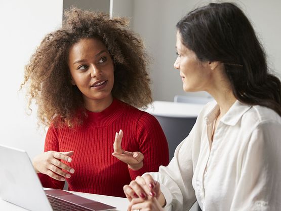 One of the tutors listening to a Student.